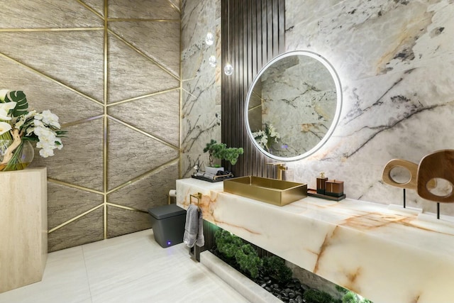 bathroom featuring tile patterned floors and vanity