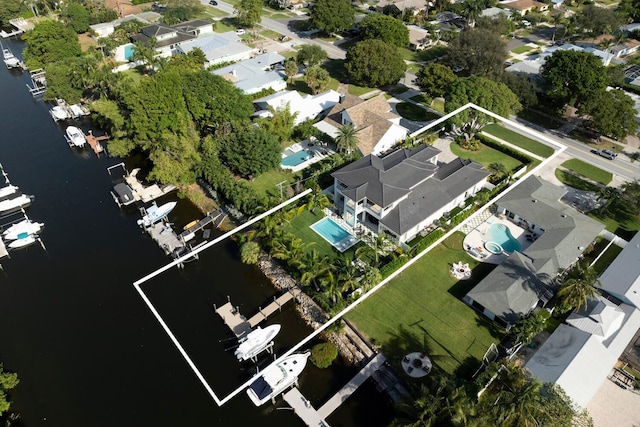 birds eye view of property featuring a water view