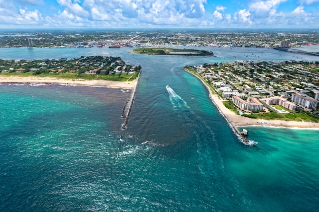 aerial view featuring a view of the beach and a water view