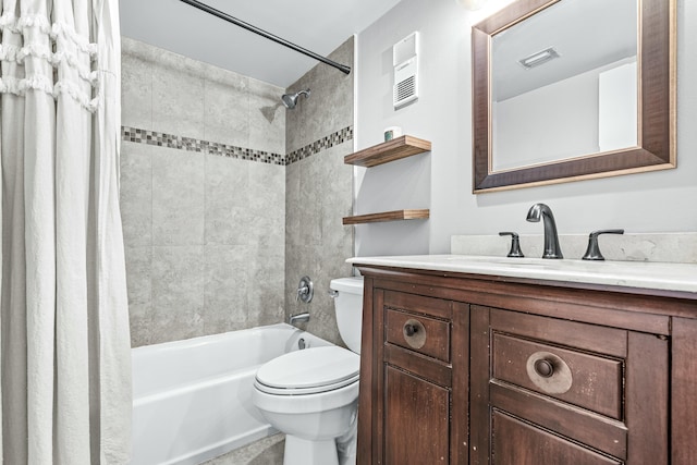 full bathroom with vanity, toilet, and shower / tub combo