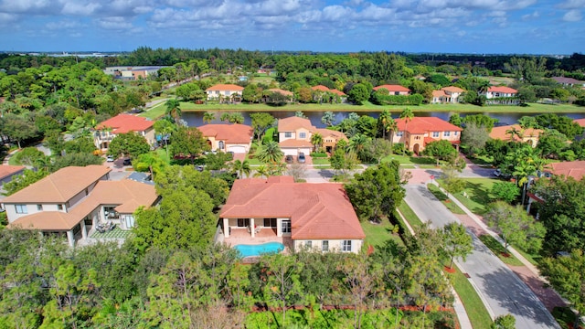 bird's eye view with a water view