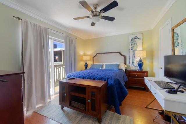 bedroom featuring wood-type flooring, ceiling fan, and ornamental molding