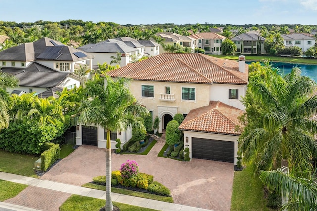 mediterranean / spanish-style home featuring a garage