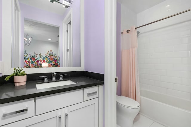 full bathroom with vanity, toilet, tile patterned flooring, and shower / bath combo