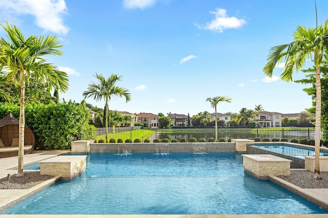 view of pool featuring pool water feature