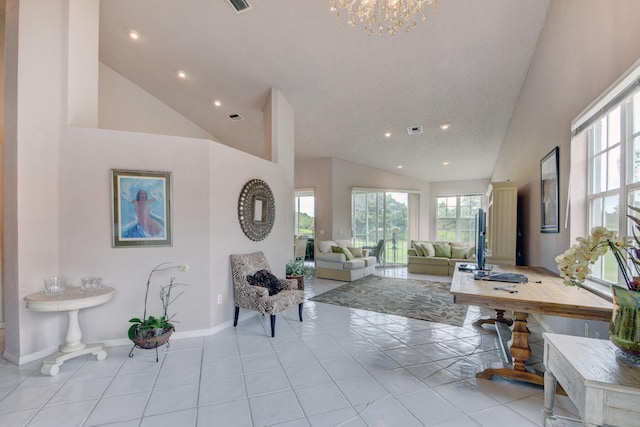 tiled living room featuring a notable chandelier, a textured ceiling, and high vaulted ceiling