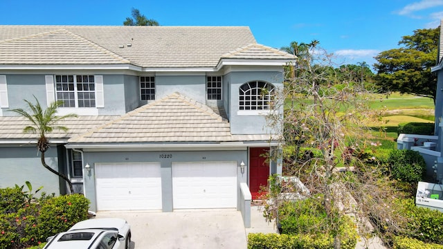 front of property featuring a garage