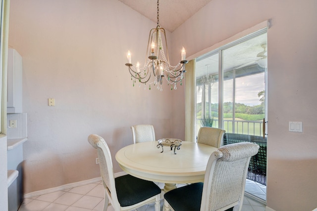 tiled dining area with an inviting chandelier