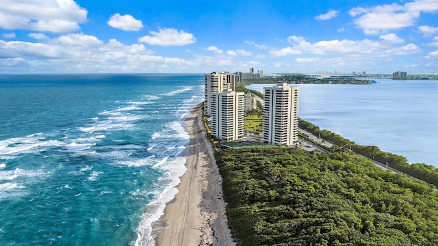 bird's eye view featuring a water view and a view of the beach