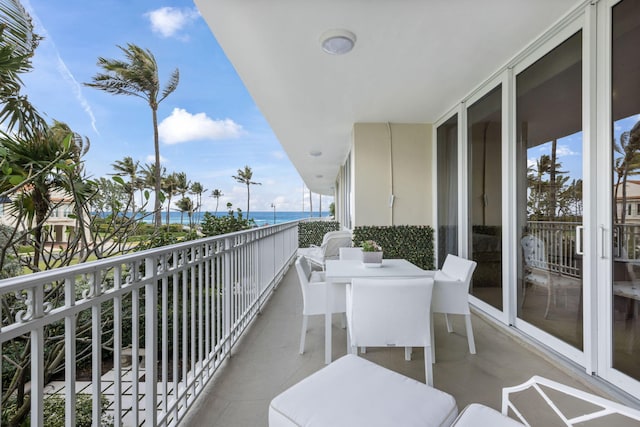 balcony featuring a water view