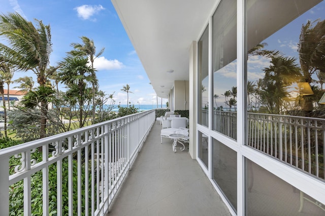 balcony featuring a water view