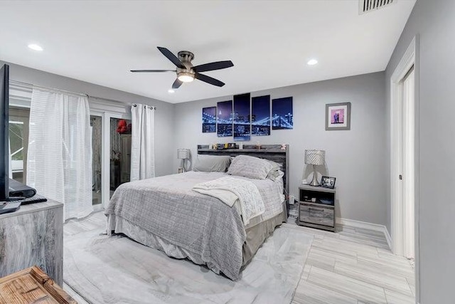 bedroom featuring ceiling fan and light hardwood / wood-style flooring