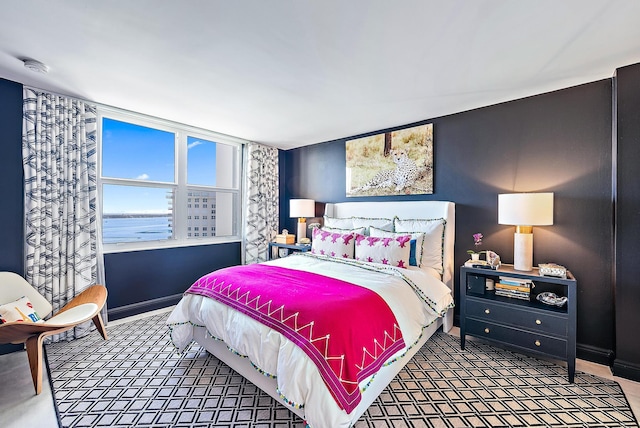 bedroom with a water view