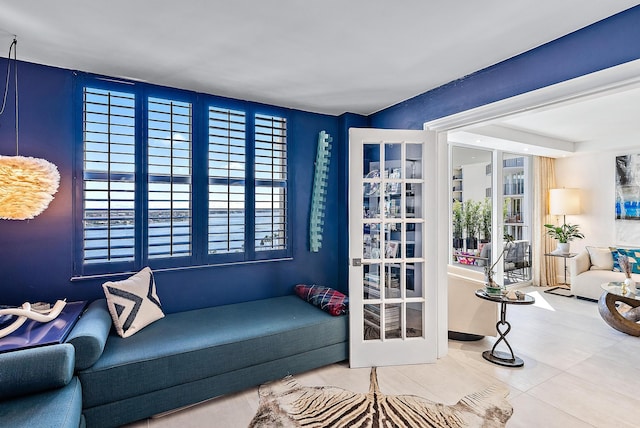 living area with tile patterned flooring