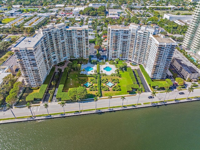 birds eye view of property with a water view