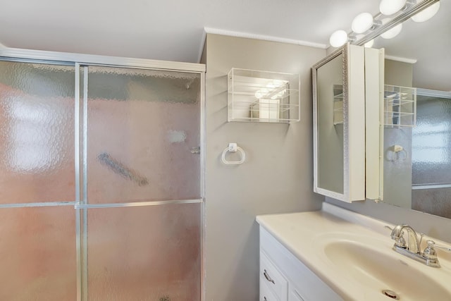 bathroom featuring vanity and walk in shower