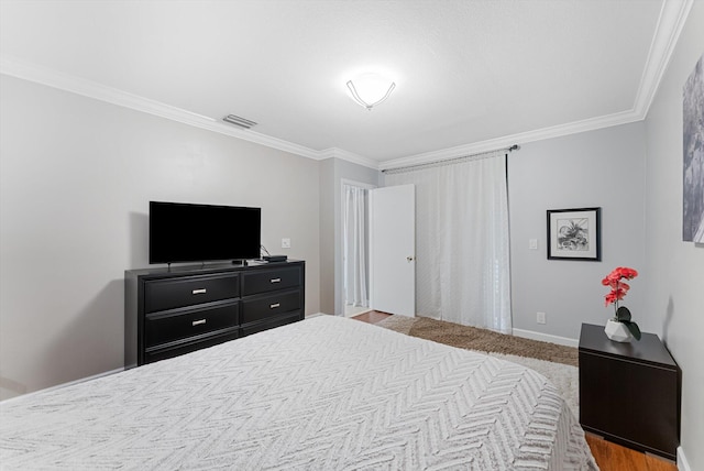 bedroom featuring crown molding