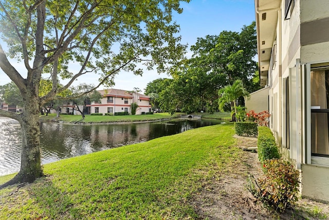 view of yard with a water view