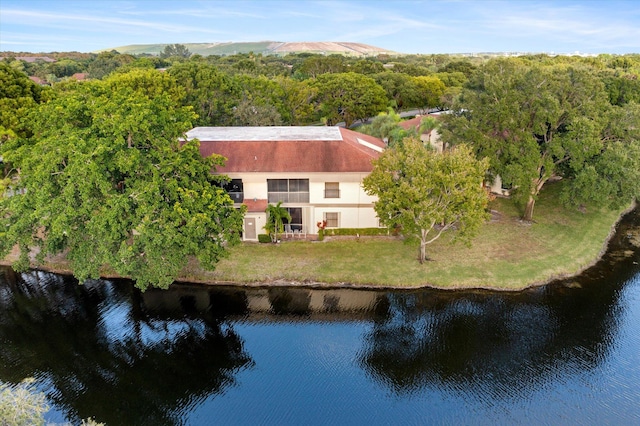 bird's eye view with a water view