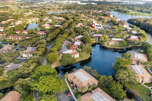 drone / aerial view featuring a water view