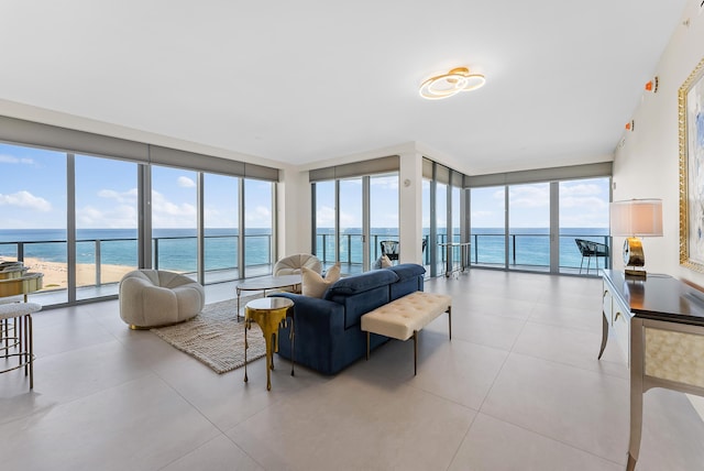 living room with a water view and a wealth of natural light