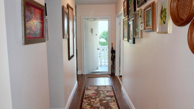 hallway featuring dark hardwood / wood-style floors