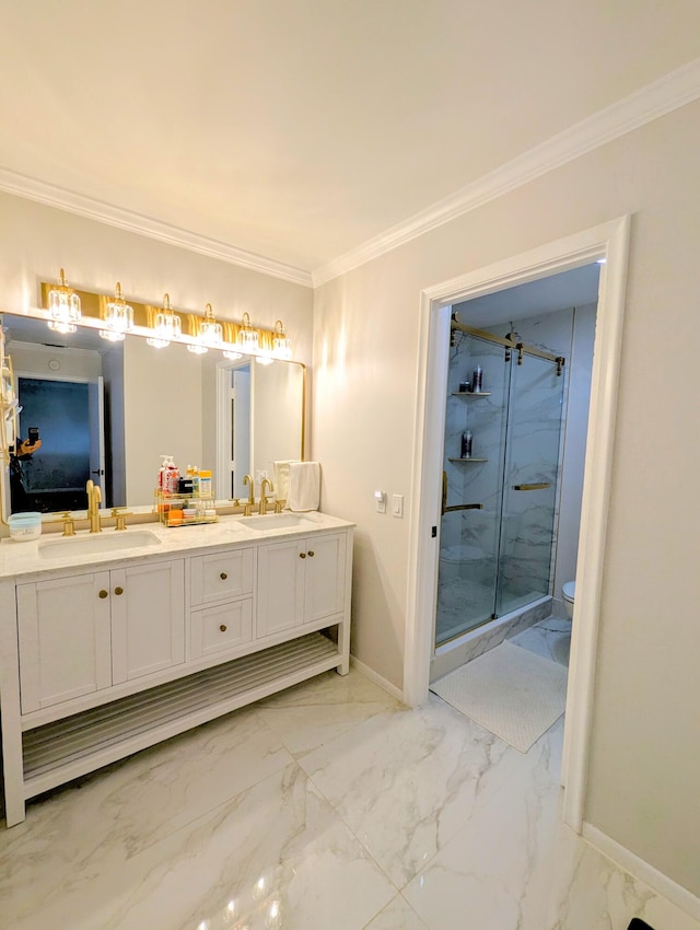 bathroom featuring vanity, toilet, a shower with door, and ornamental molding