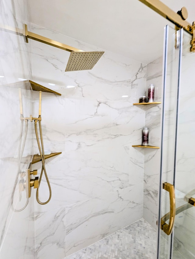 bathroom featuring an enclosed shower