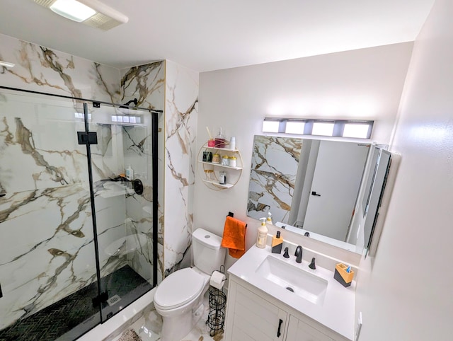 bathroom with vanity, toilet, and a shower with door