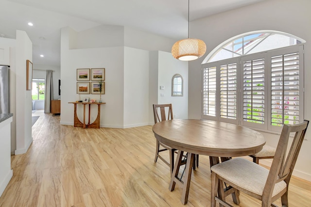 dining area featuring light wood-type flooring