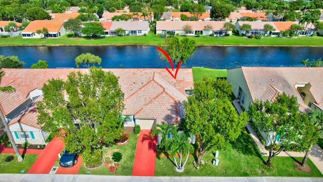 bird's eye view with a water view