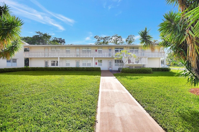 view of front of home with a front yard