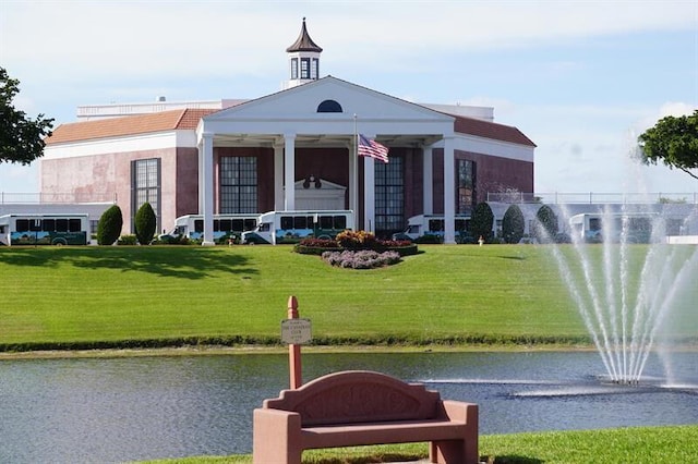 view of building exterior featuring a water view