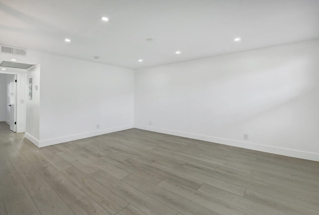 spare room with light wood-type flooring