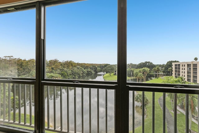 exterior space featuring plenty of natural light and a water view