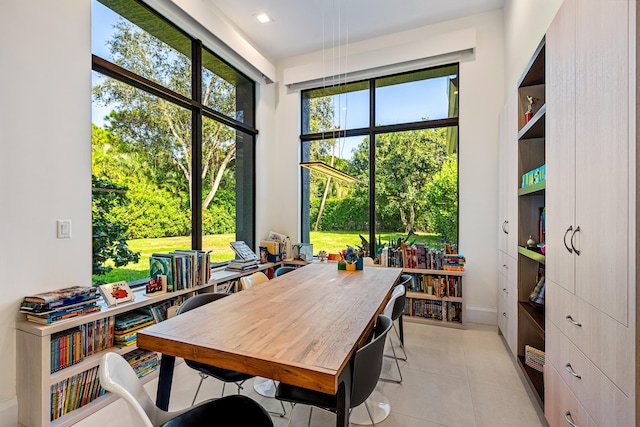 home office with light tile patterned floors