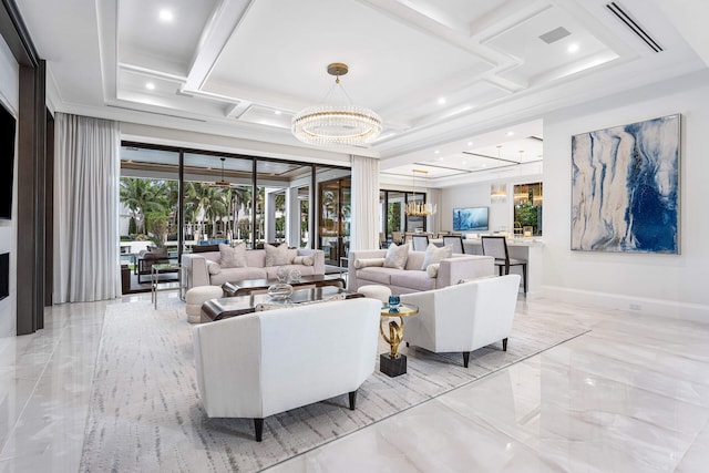 living room featuring a notable chandelier and coffered ceiling