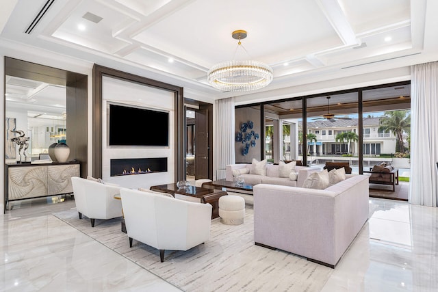 living room featuring a chandelier, a fireplace, and coffered ceiling