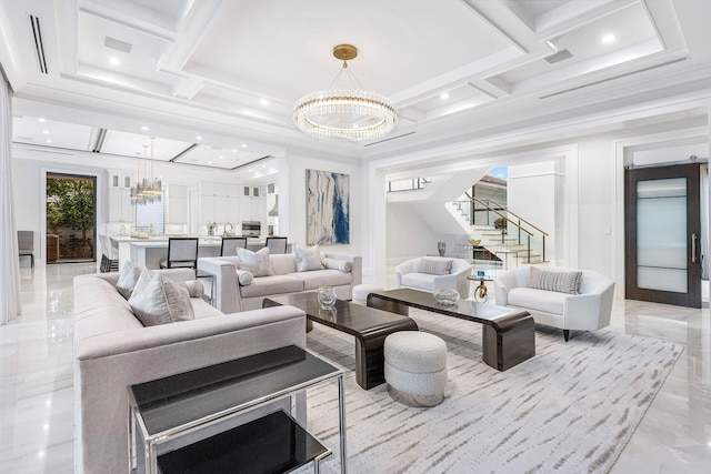 living room featuring coffered ceiling, ornamental molding, and an inviting chandelier