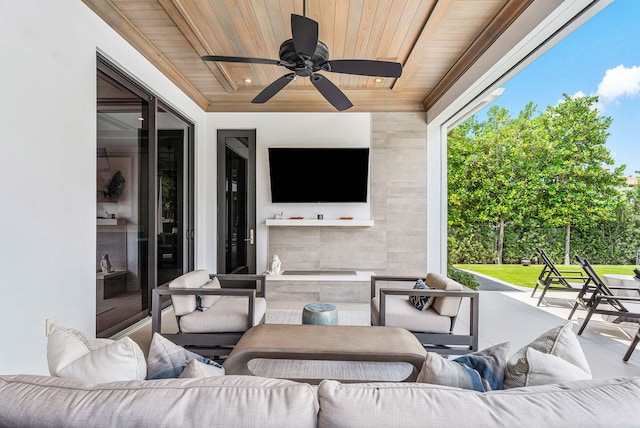 view of patio / terrace featuring ceiling fan