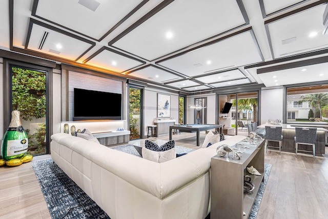 living room featuring light hardwood / wood-style flooring, beamed ceiling, coffered ceiling, and billiards