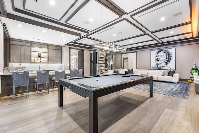 playroom featuring light hardwood / wood-style floors, bar, coffered ceiling, and billiards