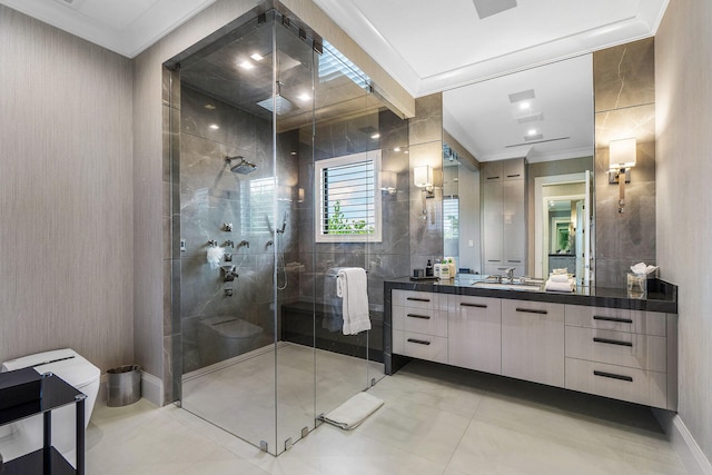 bathroom featuring vanity, ornamental molding, and walk in shower