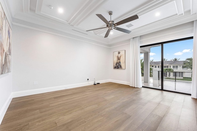 empty room featuring crown molding, beamed ceiling, wood-type flooring, and ceiling fan