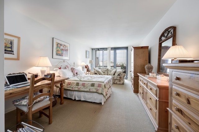 bedroom with light colored carpet