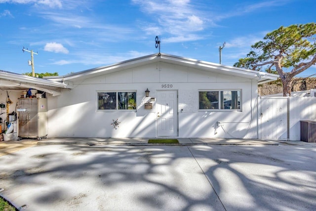 rear view of property with a patio