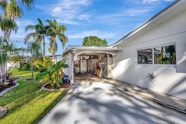 view of side of property with a yard