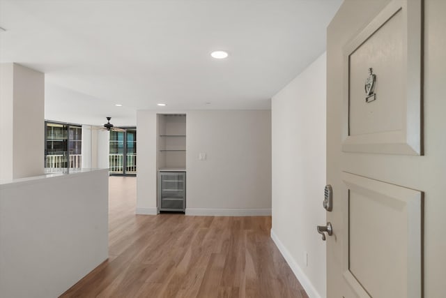 interior space featuring light wood-type flooring and wine cooler