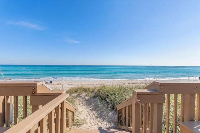 view of water feature with a beach view