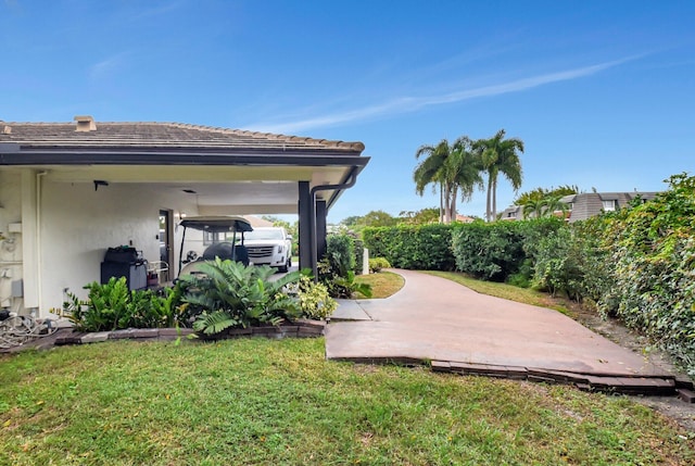 view of yard featuring a carport